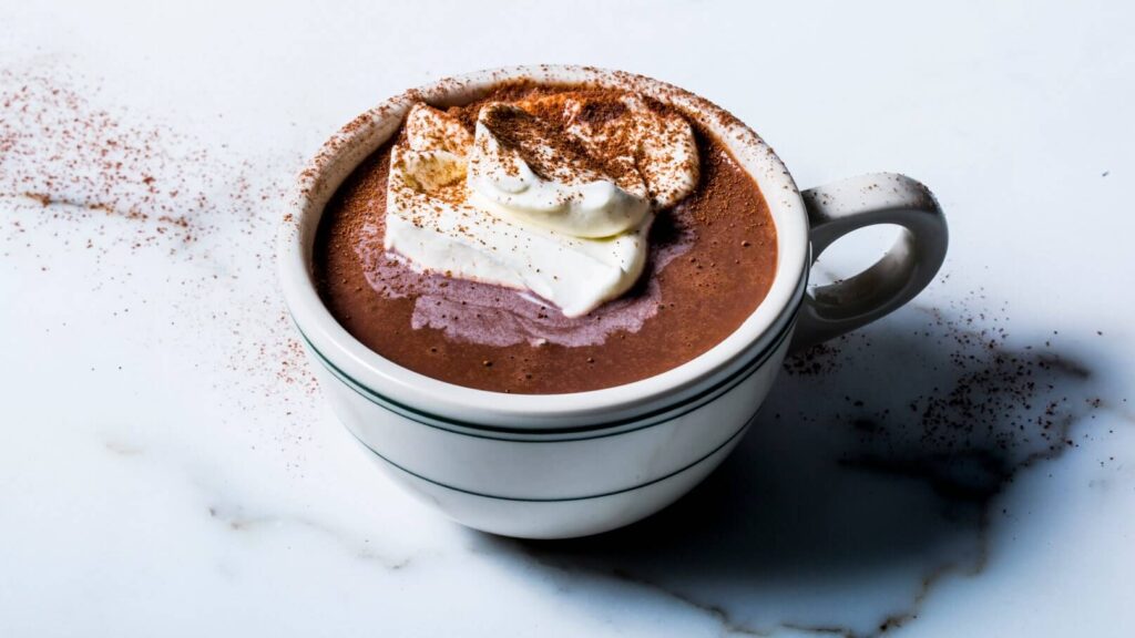 Hot chocolate, also known as hot cocoa or drinking chocolate, is a heated drink