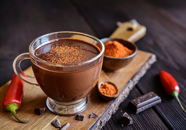 Hot chocolate, also known as hot cocoa or drinking chocolate, is a heated drink